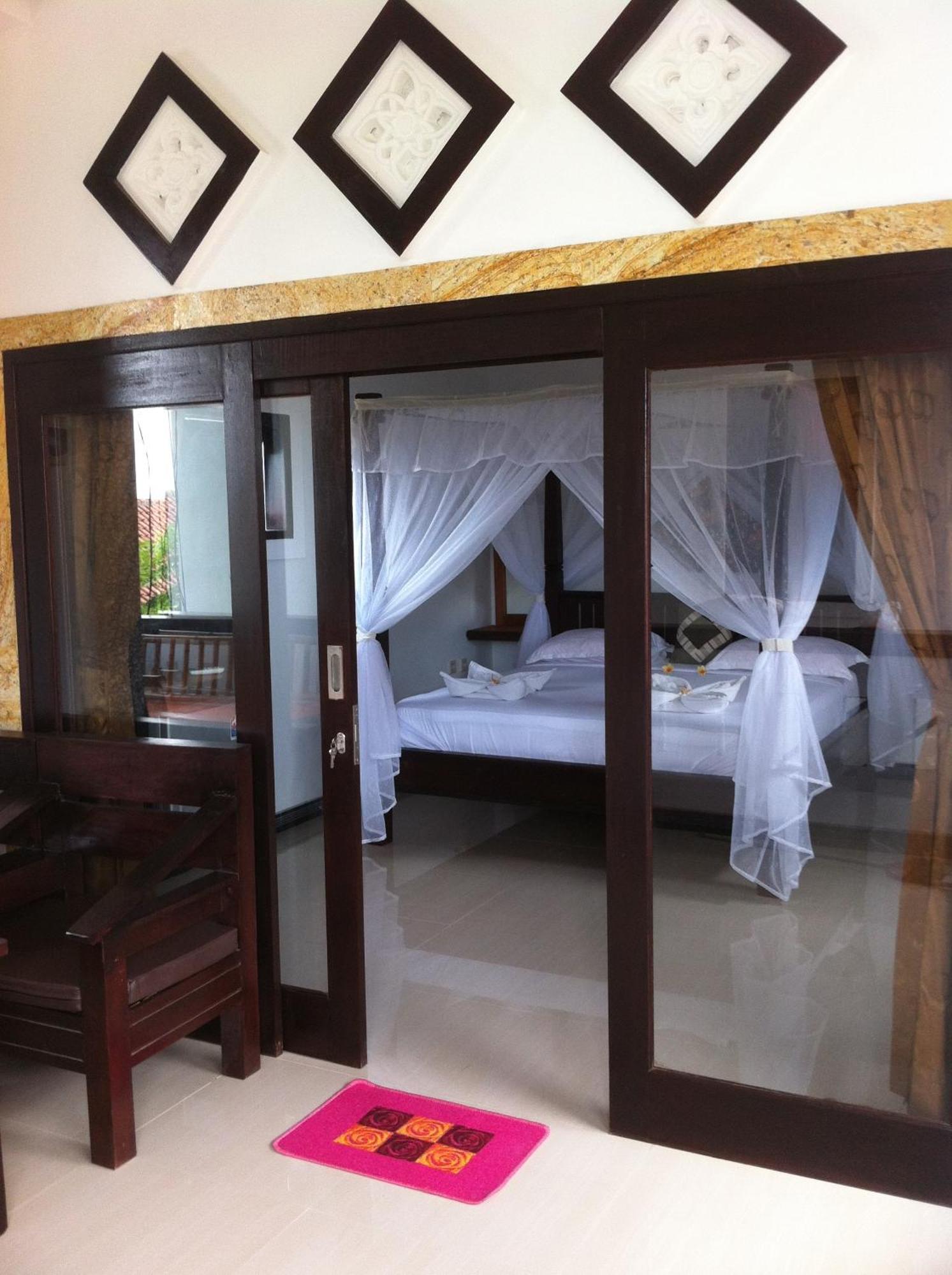 Bubu Racok Homestay Amed Quarto foto